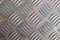 Corrugated metal sheet close up. White Checker Plate abstract floor metal stanless background stainless pattern surface