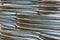 Corrugated stainless metal tubes for water supply. Abstract industrial background