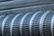 Corrugated surface of crimped and ribbed metal pipe