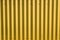 Corrugated yellow metal