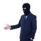 Corruption concept - man in business suit and black mask with ha