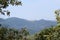 Cortegana town and castle among chestnut trees, cork oaks and holm oaks in the Aracena mountain range, Huelva. Spain