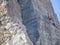 Cortina, Italy. Amazing view of the climbers on the walls of the famous rocks of the 5 towers. Extreme climbing