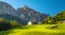 Corvara village, alpine village in Dolimite Alps at sunny summer day, Italy