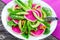 Cos lettuce, avocado, watermelon radish salad for healthy dinner