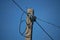Coseup of old electricity pole, wire, cctv. Electricity power pole. A convoluted mess of wires and cables clutter