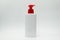 Cosmetic bottle with red pump