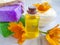 Cosmetic cream essential , healthy freshness relaxation calendula flower soap on concrete background