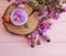 cosmetic cream, extract moisturizer , flower organic on a pink wooden background