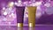 Cosmetic cream and purple violet color background with defocused blurry light bokeh. Skin care package promotional template. Gloss