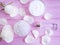 Cosmetic cream, rose flower moisturizer , accessories salt on a pink wooden background