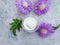 Cosmetic cream, treatment flower lotion   facial therapy healthy relaxation organic on a  background product