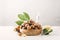 Cosmetic macadamia nut oil on a grey concrete background