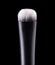 Cosmetic makeup eyeshadow brush isolated on a black background