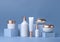Cosmetic mock up set. Cosmetic packaging bottles jar and tube. Make up blank face cream tube, spray. Trendy white gold realistic