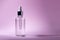 Cosmetic pipette with hyaluronic acid. Transparent gel with bubbles close-up. Gel cream or serum. A sample of a cosmetic product.