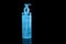 Cosmetic product for makeup remove. Blue liquid with small air bubbles. Bottle with dispenser