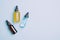 Cosmetic products gel serum lubricant hyaluronic acid with oxygen bubbles glass vials with a pipette blue background