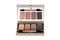 Cosmetic products isolated. Close-up of a elegant cosmetic multi-color box with mirror, eye shadows powder and a eye shadow brush