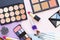 Cosmetic products on pastel colors background