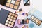 Cosmetic products on pastel colors background