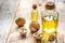 Cosmetic and therapeutic walnut oil on wooden background