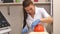 Cosmetician removing mask from client face at beauty salon