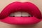 Cosmetics. Beautiful fashion bright pink lips mat make-up