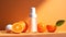 Cosmetics with high vitamin C content.Orange bright background with halves of oranges. Banner.