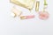 Cosmetics for make-up pink with gold on a white background. Copy