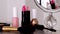 Cosmetics, makeup products on dressing vanity table, lipstick, brush, mascara, nailpolish and powder for luxury beauty