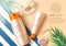 Cosmetics sunscreen product vector banner template. Cosmetic mock up sunblock products with summer elements in sand background.