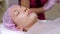 Cosmetologist makes the Rejuvenating facial injections procedure for tightening and smoothing wrinkles on the face skin