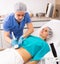 Cosmetologist performing female body ultrasound cavitation
