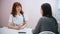 Cosmetology clinic. Doctor and patient. Doctor having a conversation with a patient