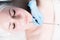 Cosmetology and facials. Mechanical removal of the cleaning of an adult woman`s face in the cosmetics office is a