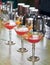 Cosmopolitan classic red cocktails in an elegant glass on the bar