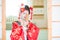 Cosplay. beautiful, modest geisha in a red kimono