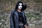 Cosplayer dressed as Eric Draven, character from The Crow movie at the Lucca Comics and Games 2022 cosplay event.