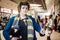 Cosplayer dressed as Newt Scamander.