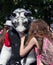 Cosplayer dressed as tiger and a girl at Cosplay festival
