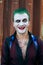 Cosplayer man in Joker costume