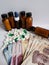 the cost of medicine, a variety of medicines and mexican banknotes, background and texture