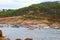 Costa Brava landscape, Playa de Tamariu in Girona Spain, water sports canoeing