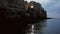 Costa di Polignano a Mare dalla barca dopo il tramonto