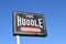 COSTA MESA, CALIFORNIA - 4 APR 2023: Sign for The Huddle a dive bar offering multiple TVs showing sports, pool tables, dart boards