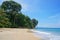 Costa Rica Caribbean beach with lush vegetation