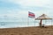 Costa Rica flag flying on Jaco beach, in the Puntarenas province of Coata Rica