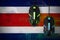 Costa Rica flag and two mice with backlight. Online cooperative games. Cyber sport team