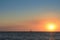 Costa Rican Pacific sunset with lone sailboat